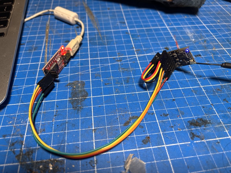 PWMP7 receiver wired to FTDI adapter for UART flashing